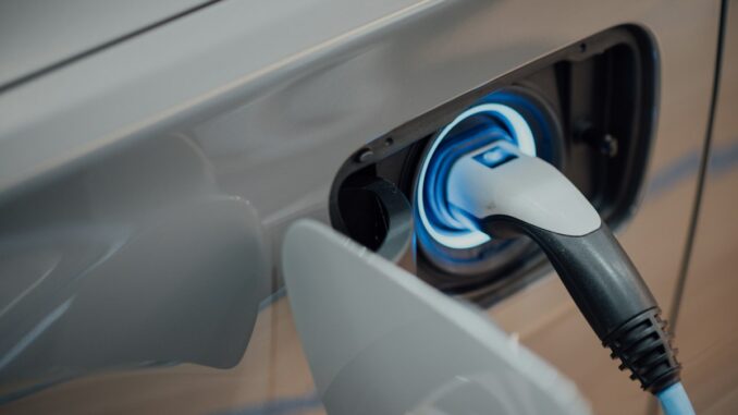 Charging cable plugged into an electric car