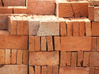 Stacks of red clay bricks