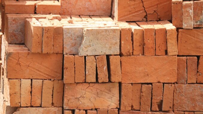 Stacks of red clay bricks