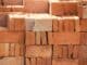 Stacks of red clay bricks