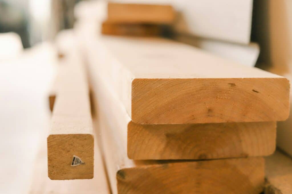 Lengths of sawn timber stacked at a builders merchant