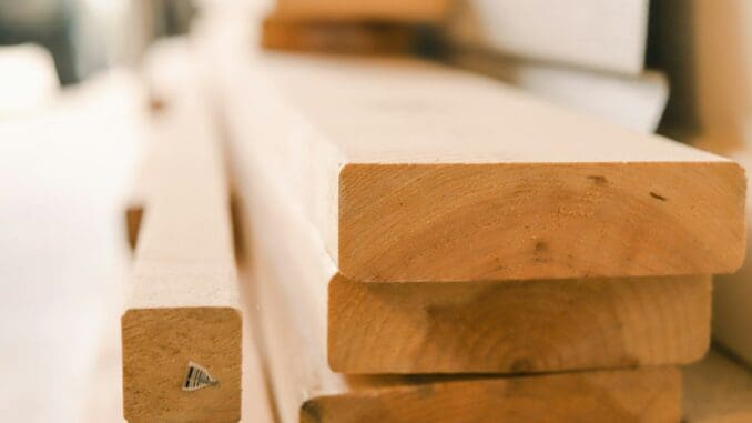 Lengths of sawn timber stacked at a builders merchant