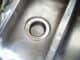 Close-up of a stainless steel kitchen sink drain